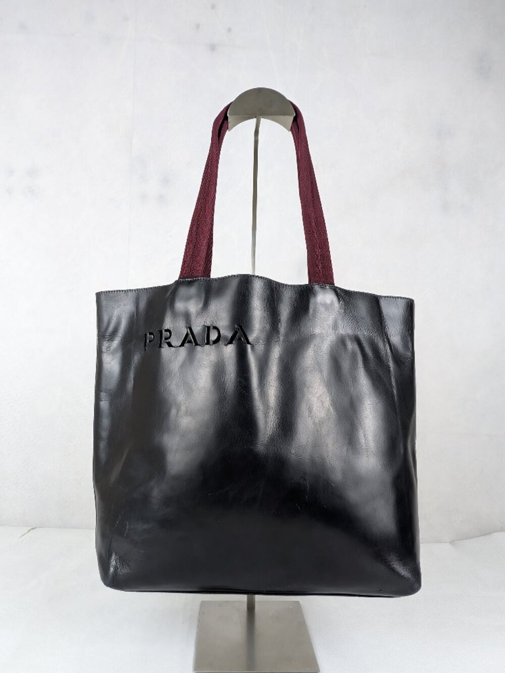 Vintage Prada Spazzolato Laser Cut Logo Tote Black Leather Bag Made in Italy.
